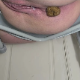 A woman takes a nice, firm shit while sitting on a potty chair. Nice, under the ass side view. Presented in 720P HD. Over a minute.